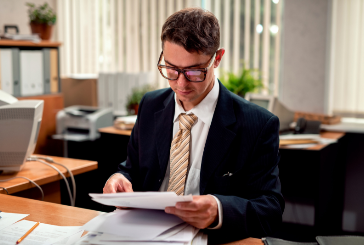 Business owner reviewing official tax notice